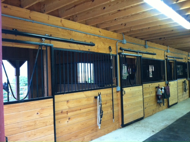 interior of board and batten B&B horse barn