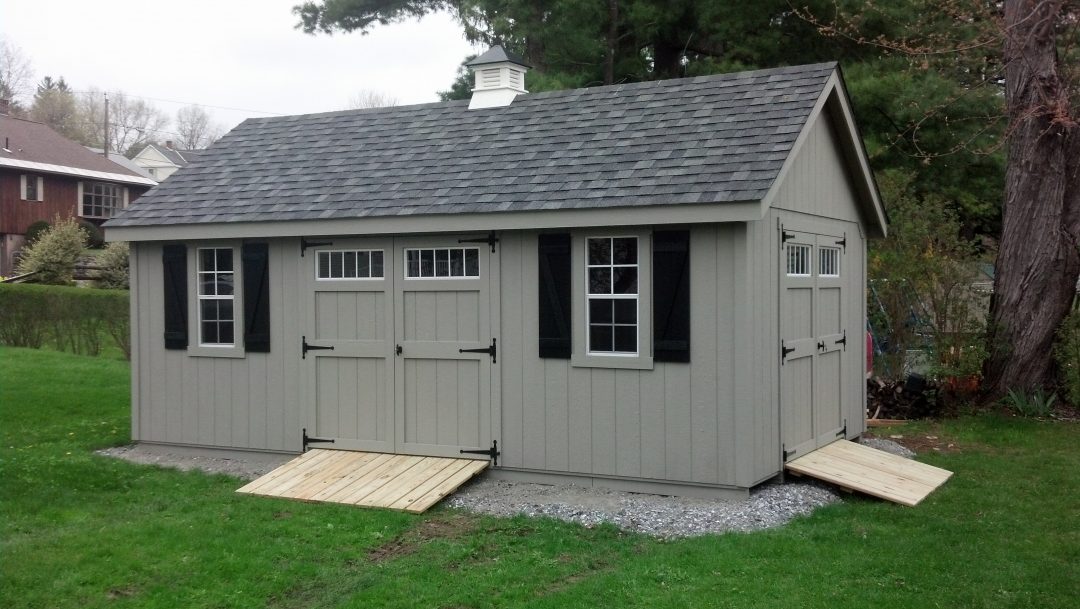 A-frame shed with two double doors and ramps delivered and installed