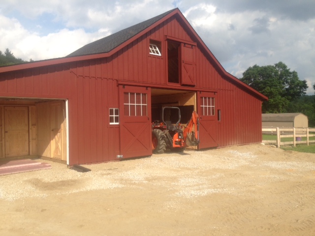 two story red horse barn and run in shed